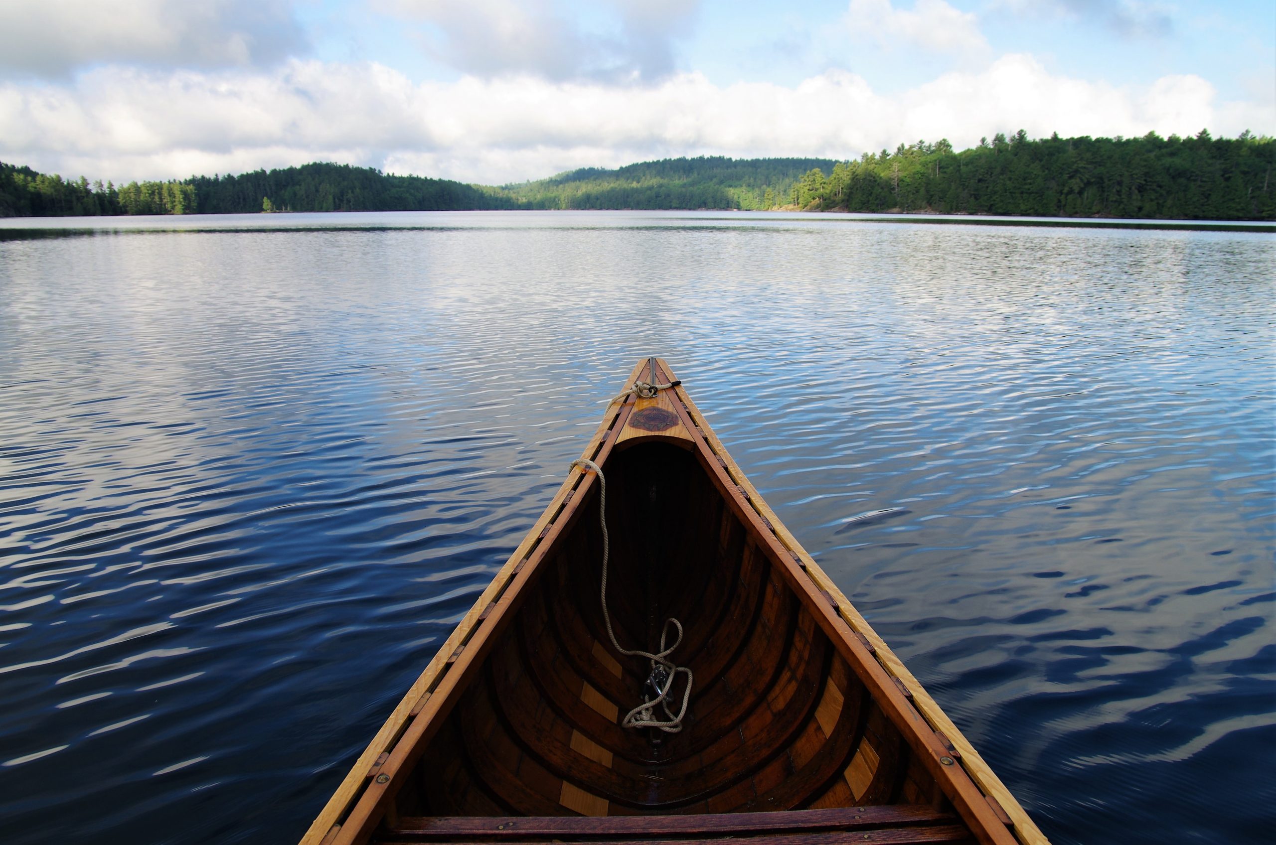 Front of a Canoe in a Lake